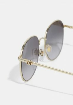 Gucci Sonnenbrille - Gold-coloured/grey - Damen -Günstiges Gucci || Knirps Geschäft 4f874537289c44ffbeac8f9311512012